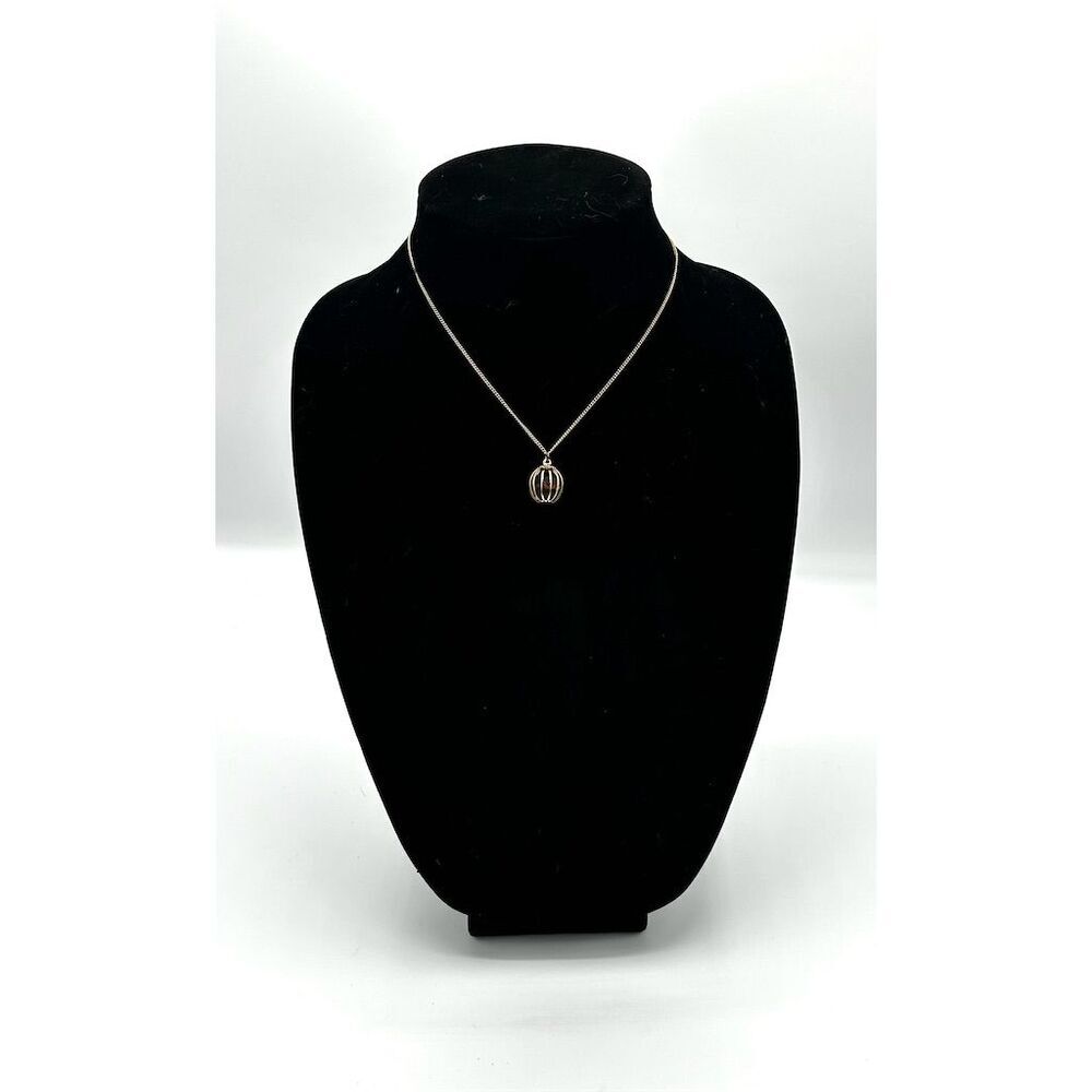 Gold Cage Pendant Necklace with Purple Crystals on Delicate Chain